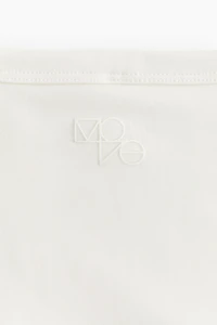 Cropped sports top with DryMove™
