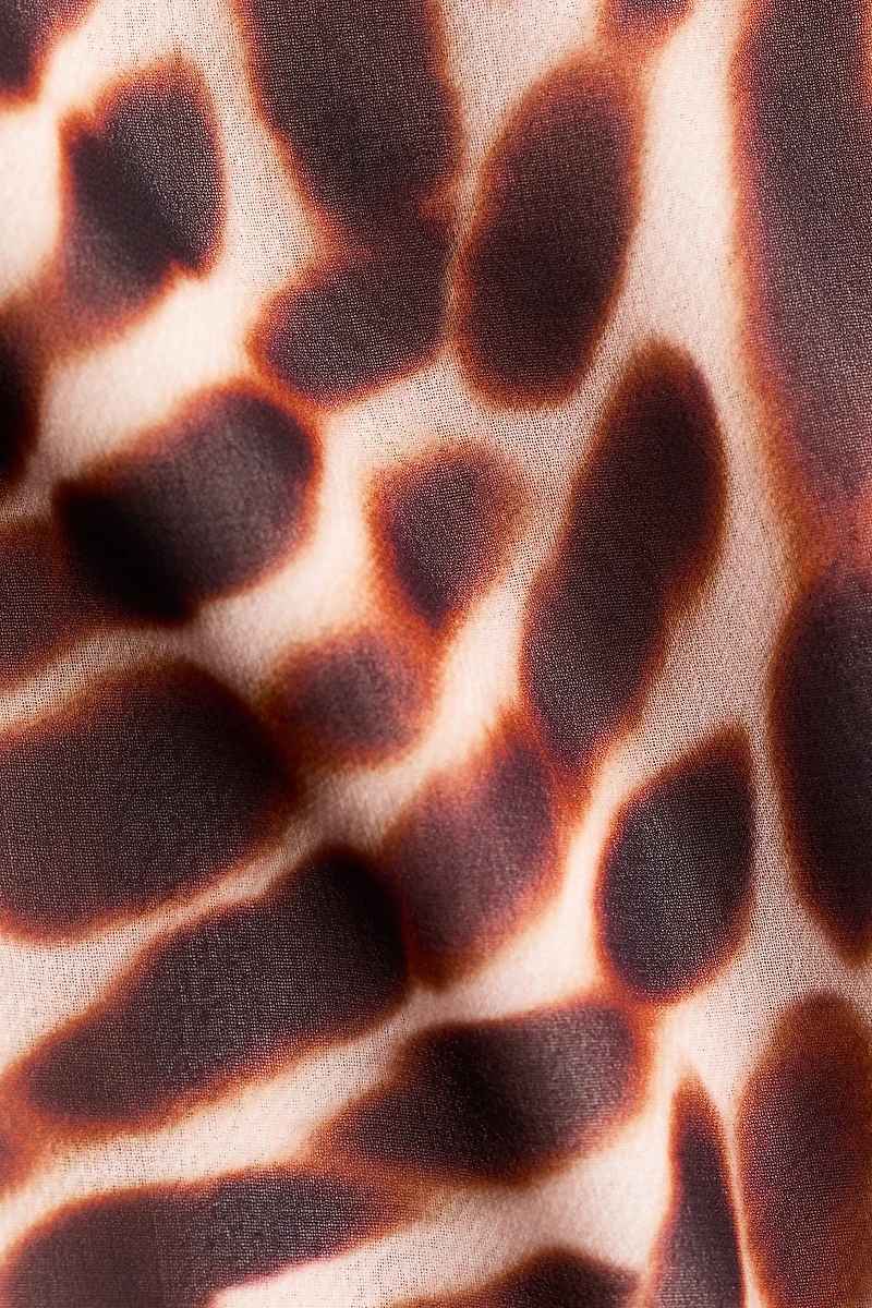 Robe sans manches avec encolure bénitier