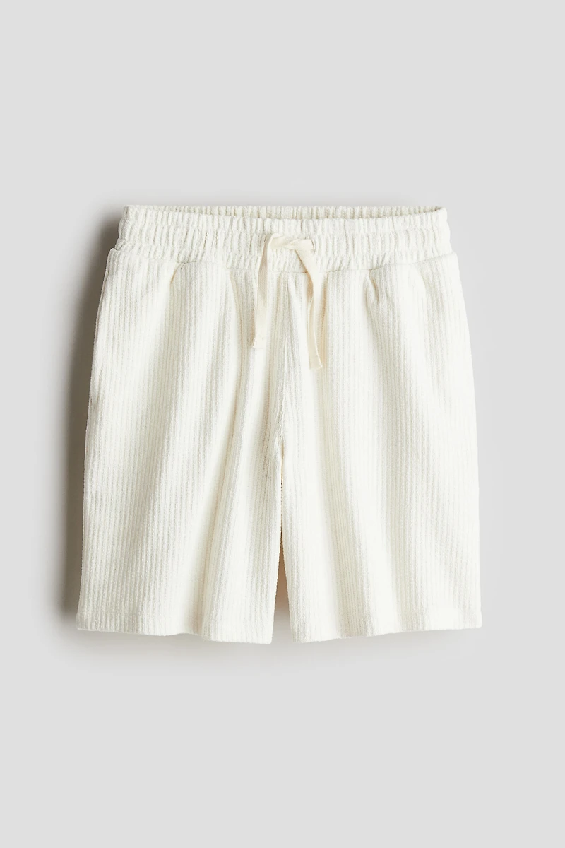 Short en tricot texturée