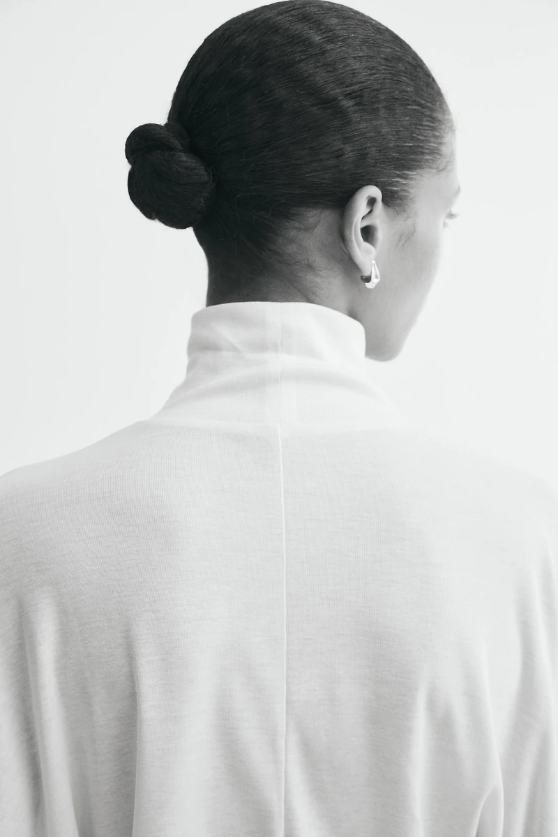 Batwing-Sleeved Mock Turtleneck Top