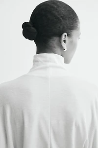 Batwing-Sleeved Mock Turtleneck Top