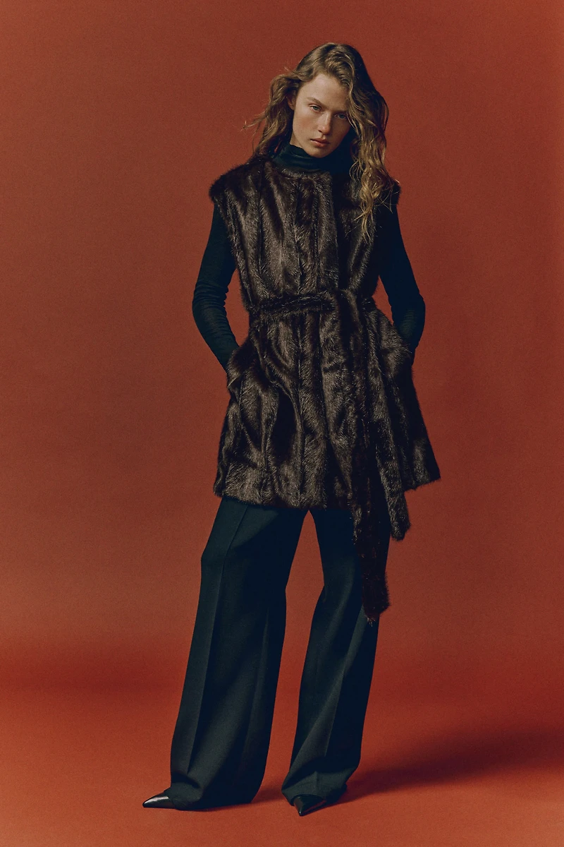 Veste sans manches avec ceinture à nouer