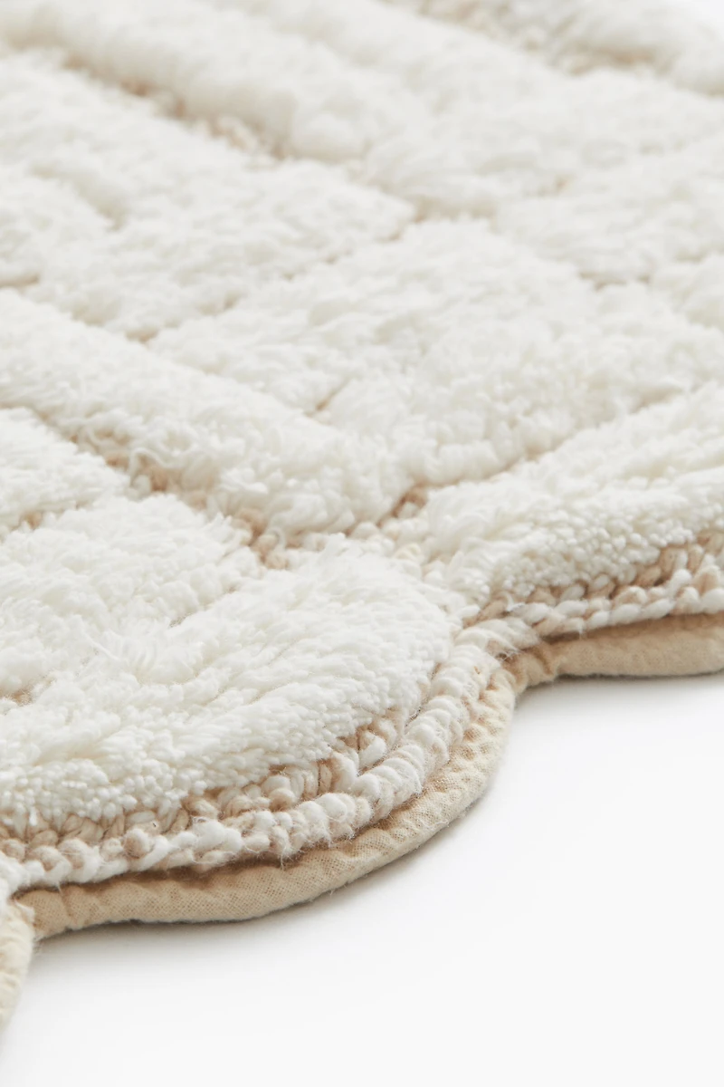 Tapis de bain en coton bouclé