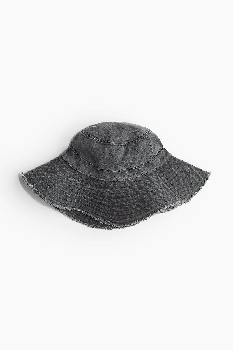 Chapeau en coton à bord frangé