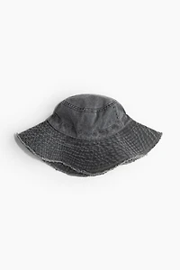 Chapeau en coton à bord frangé