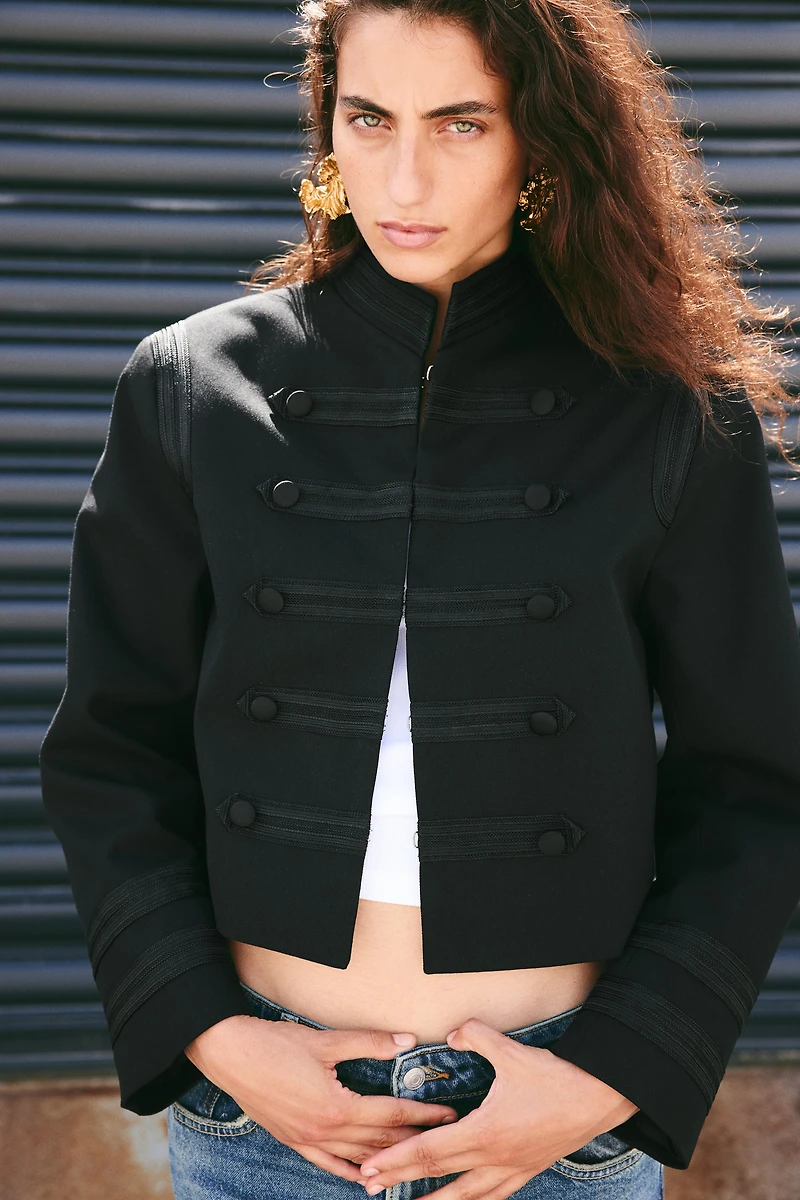 Veste à épaulettes en sergé