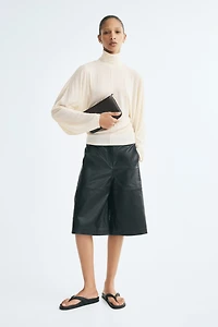 Batwing-Sleeved Mock Turtleneck Top