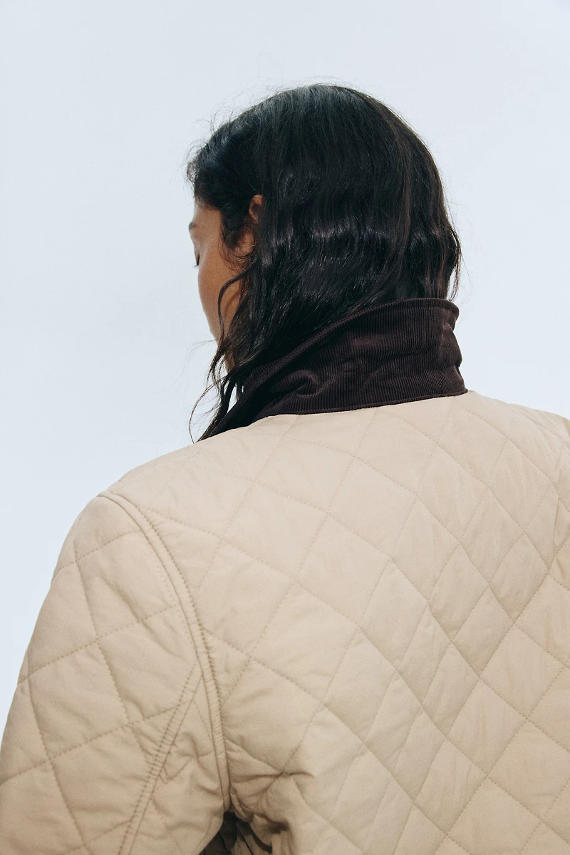 Veste matelassée avec col en velours côtelé