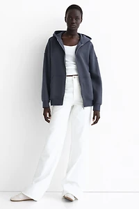 Veste ample avec capuche et fermeture éclair