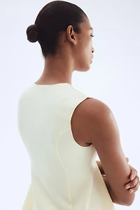 Interlock Sleeveless Peplum Top