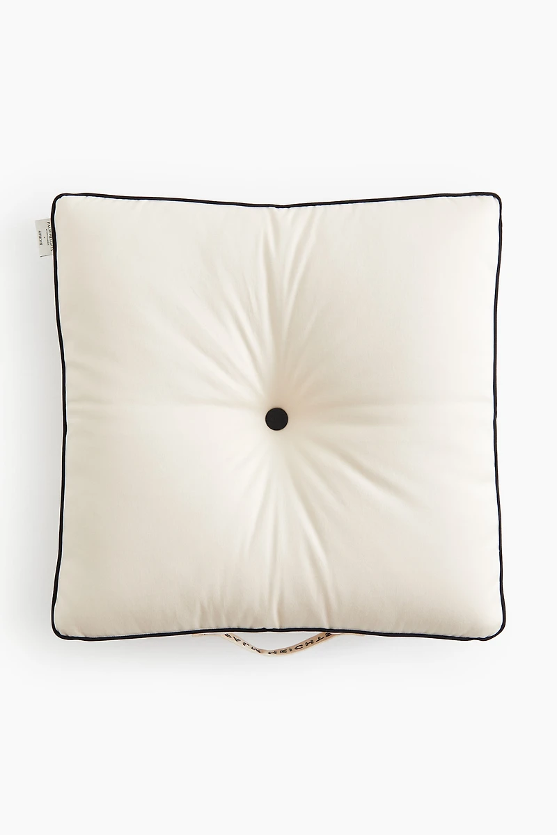 Coussin avec passepoil