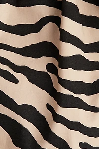 Flounced off-the-shoulder dress