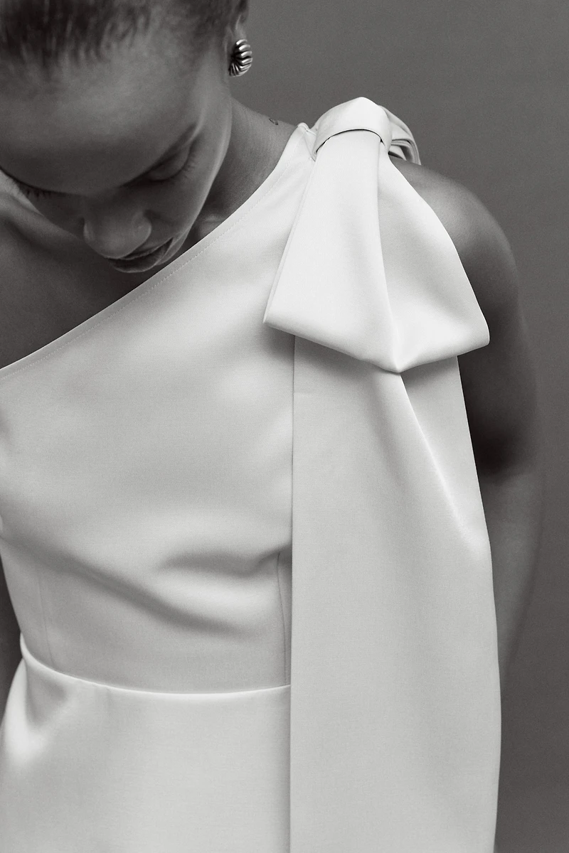 Haut asymétrique avec boucle