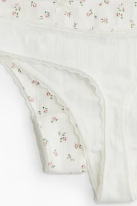 Lot de 2 culottes tanga en pointelle