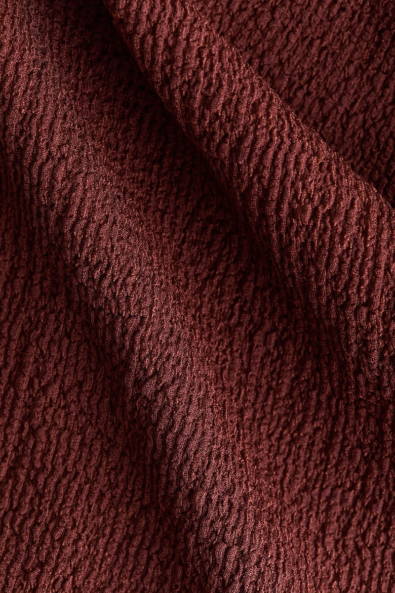 Haut portefeuille texturé