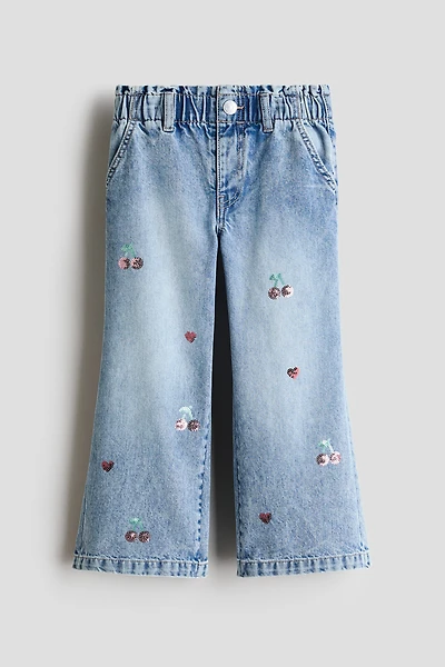 Jean jambes larges sur taille élastique