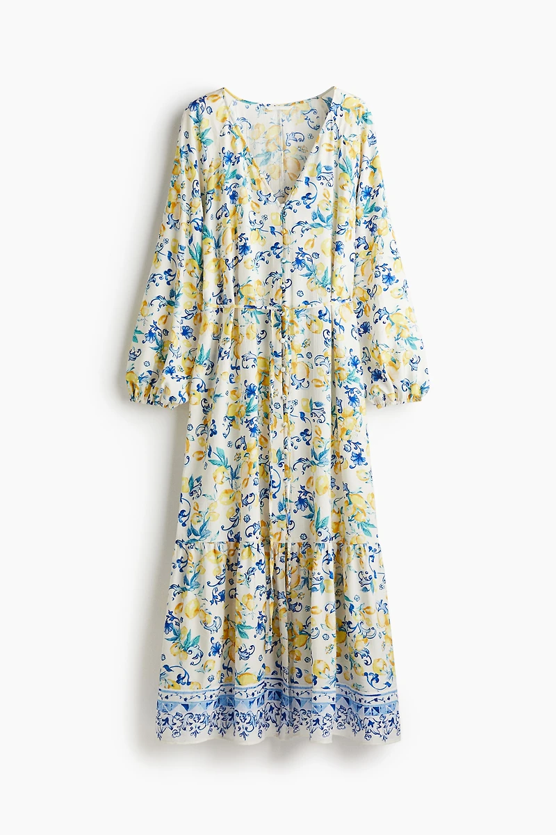 Robe en crêpe avec ceinture à nouer