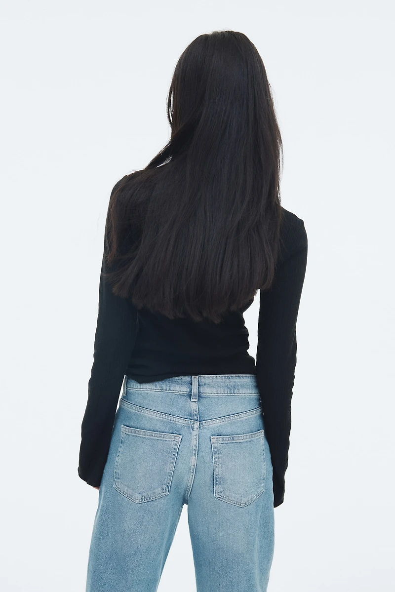 Haut côtelé avec col cheminée