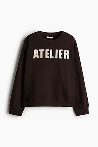 Sweatshirt with Text Motif