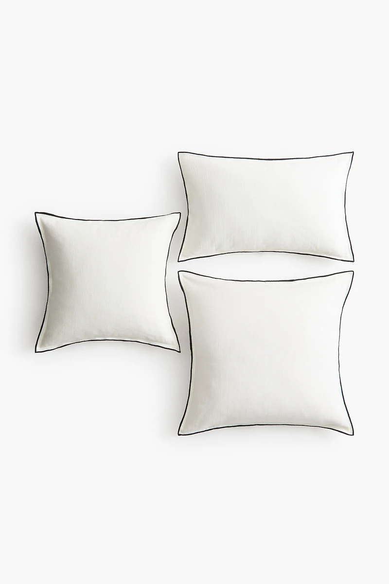 Housse de coussin en lin mélangé