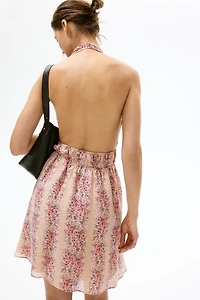 Robe à dos nu avec jupe évasée