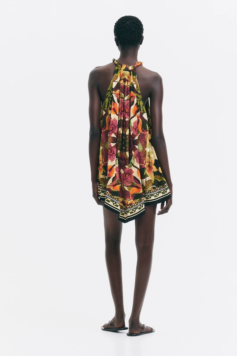 Robe à motif avec bas en pointe