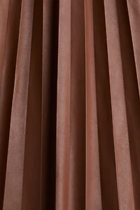 Jupe plissée en tissu enduit