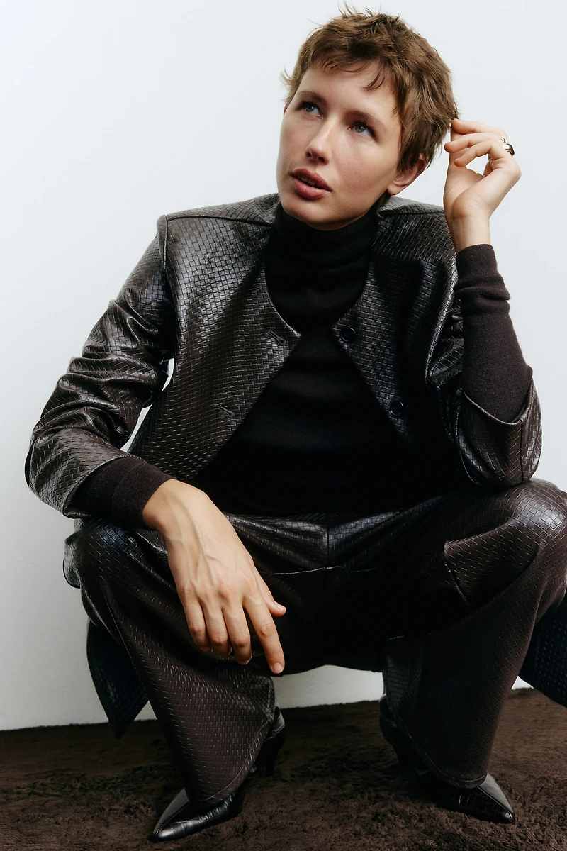 Veste en tissu enduit