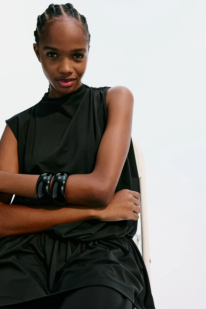 Haut asymétrique à effet drapé