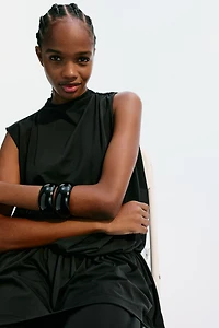 Haut asymétrique à effet drapé