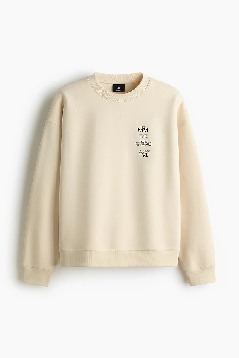 Chandail ample en molleton imprimé