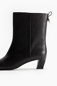 Bottines à talon en cuir