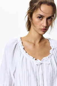 Blouse à plis nervurés