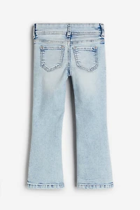 Jean très extensible à jambes évasées