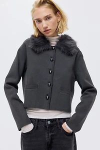 Gilet en fin tricot avec col