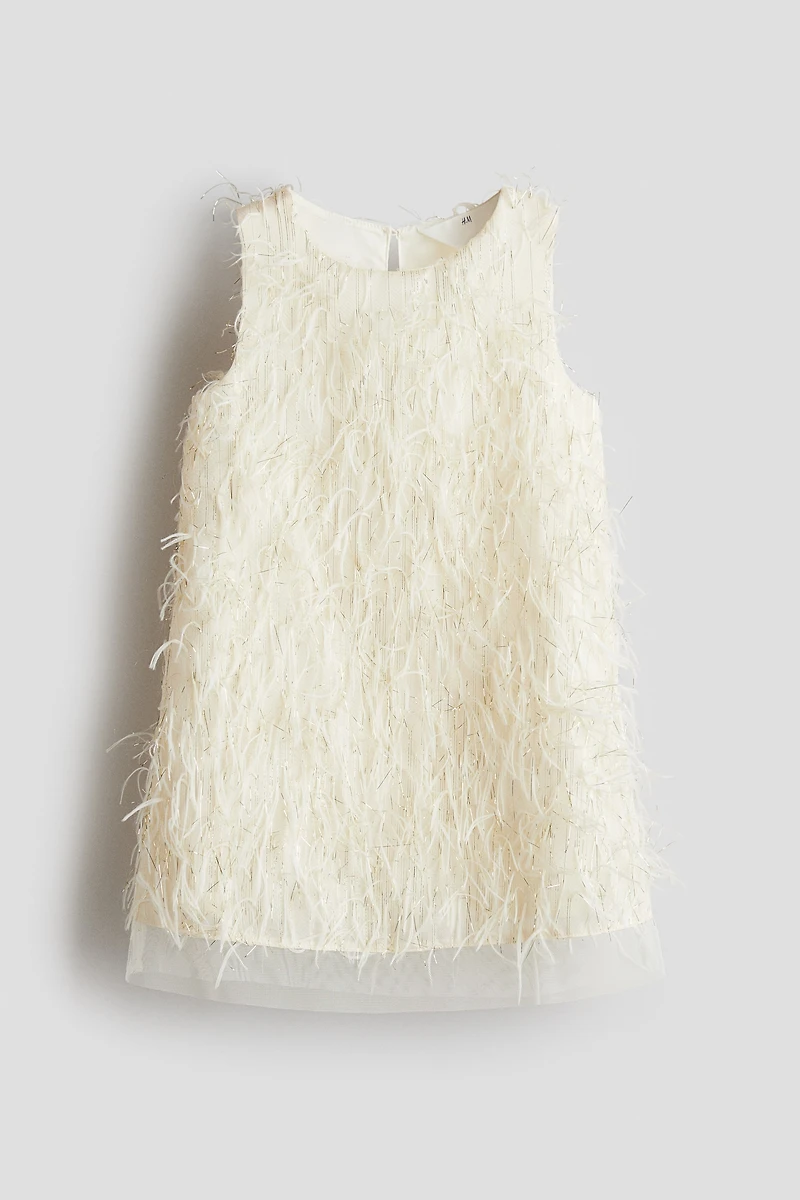 Robe à franges scintillantes