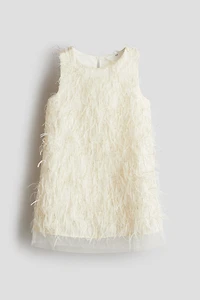 Robe à franges scintillantes