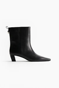 Bottines à talon en cuir