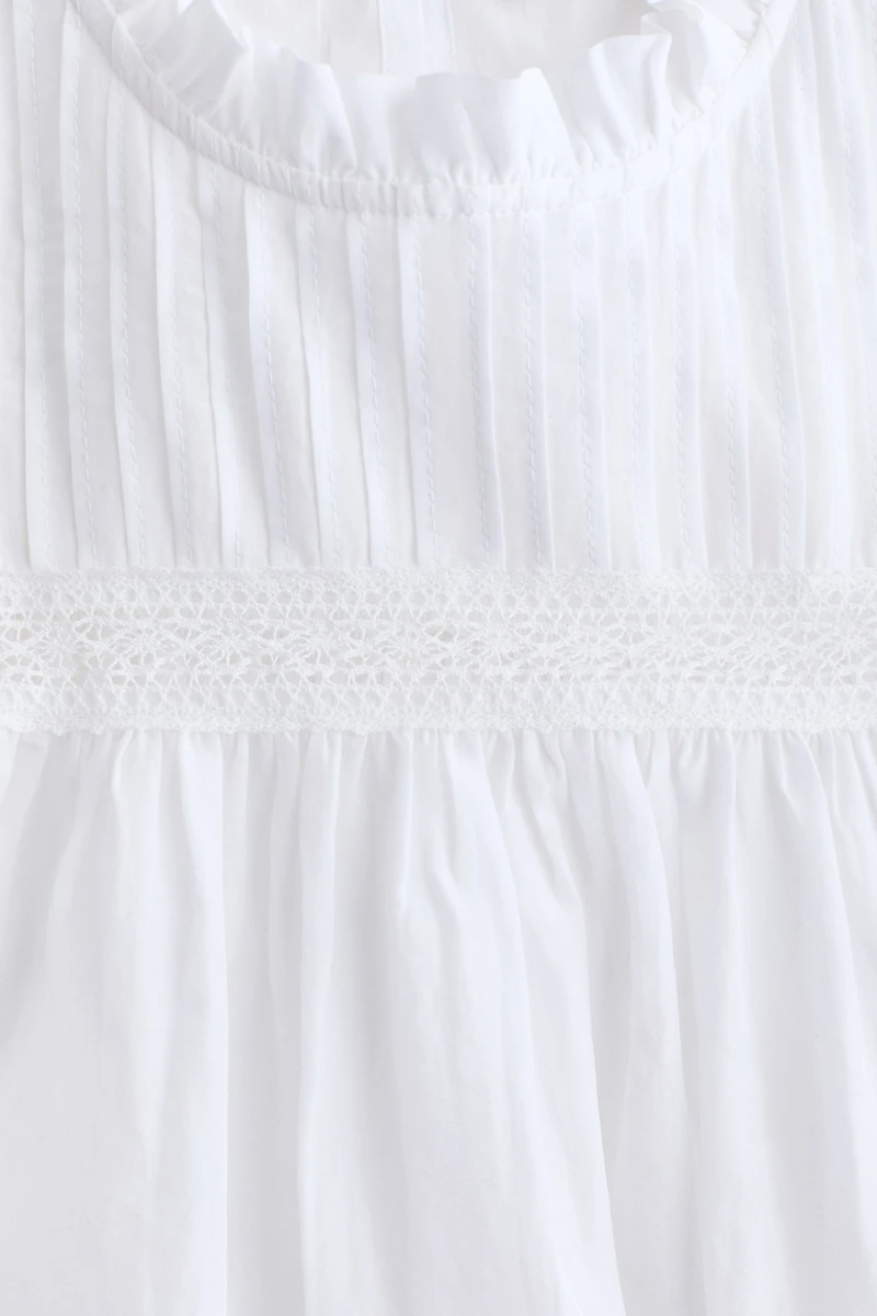 Frill-trimmed blouse