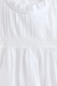 Frill-trimmed blouse