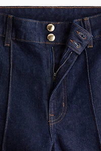 Jean ample à la cheville taille haute