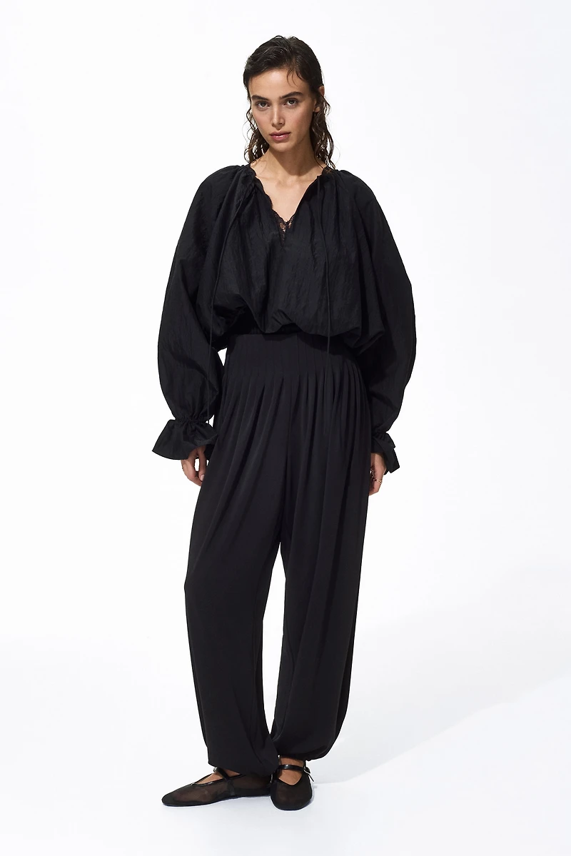 Pantalon plissé à jambes tonneau