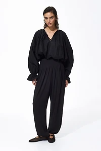 Pantalon plissé à jambes tonneau