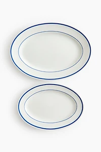Lot de 2 assiettes service en porcelaine