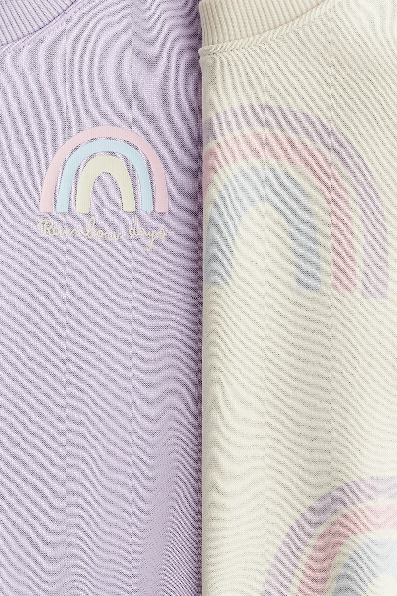 Lot de 2 chandails à manches bouffantes