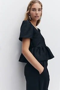 Blouse péplum en brocart