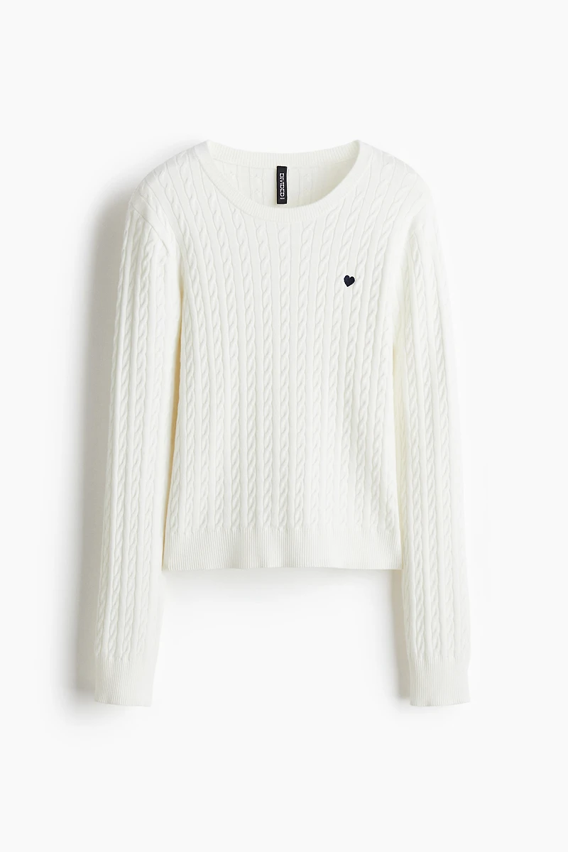 Chandail en tricot torsadé