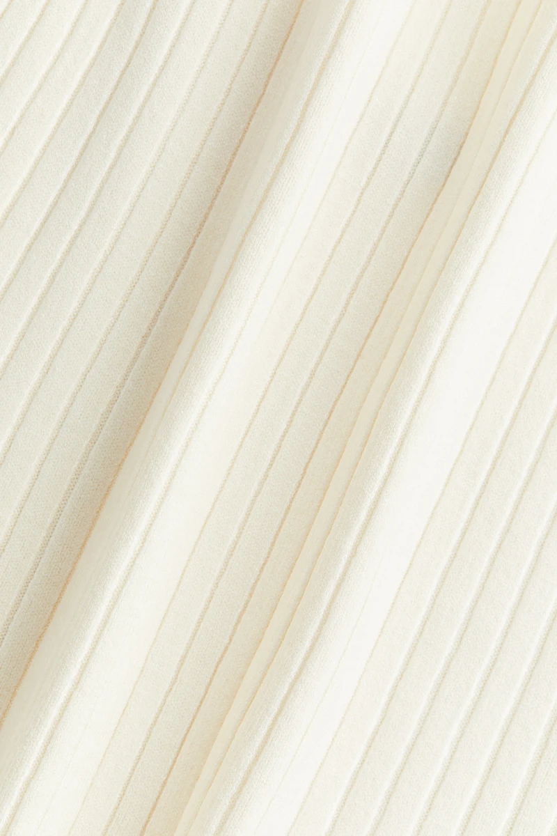 Haut à bretelles fines en tricot côtelé