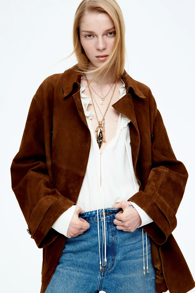 Blouse volantée avec cordon de serrage