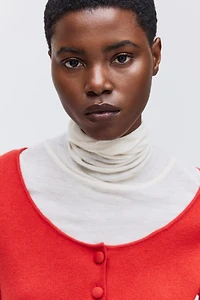 Gilet en tricot côtelé à encolure dégagée